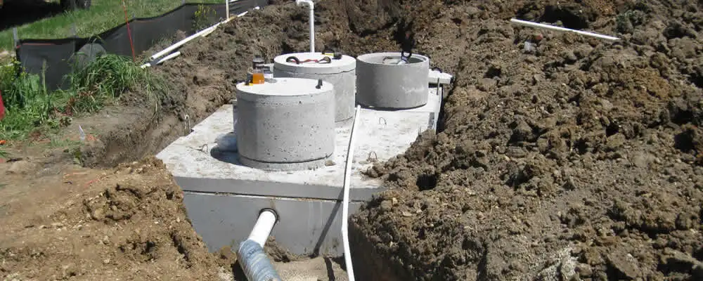 Septic system repair and installation site with tank access ports in Reno, NV
